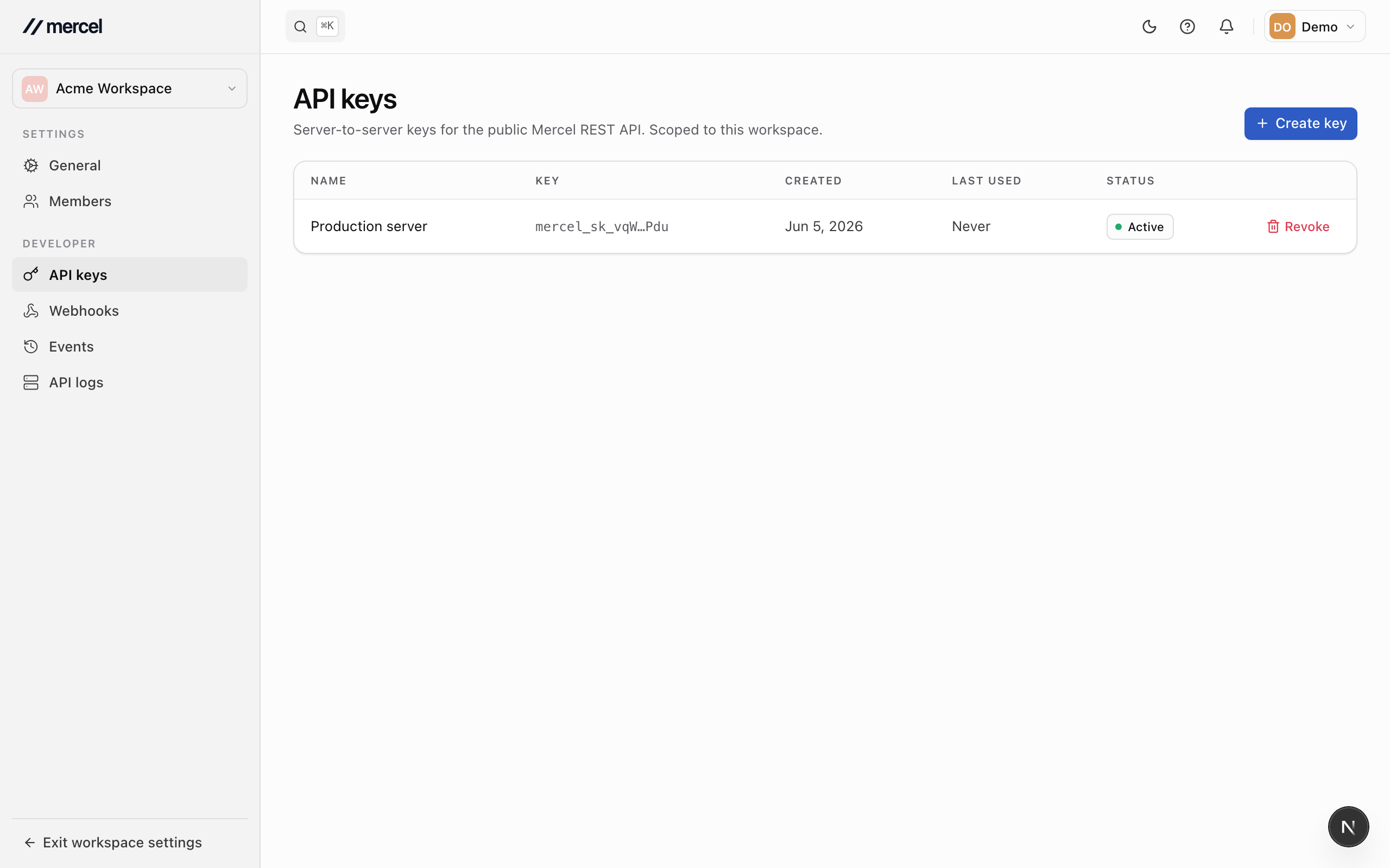 The workspace API keys page, listing a key with its masked value and creation date, and a button to create a key.